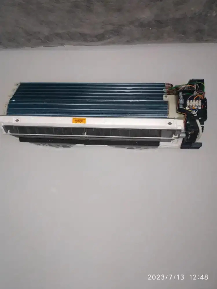 Jasa service cuci AC bongkar pasang AC service kulkas bergaransi