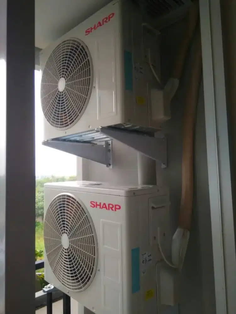 Tukang service cuci AC bongkar pasang AC service kulkas bergaransi