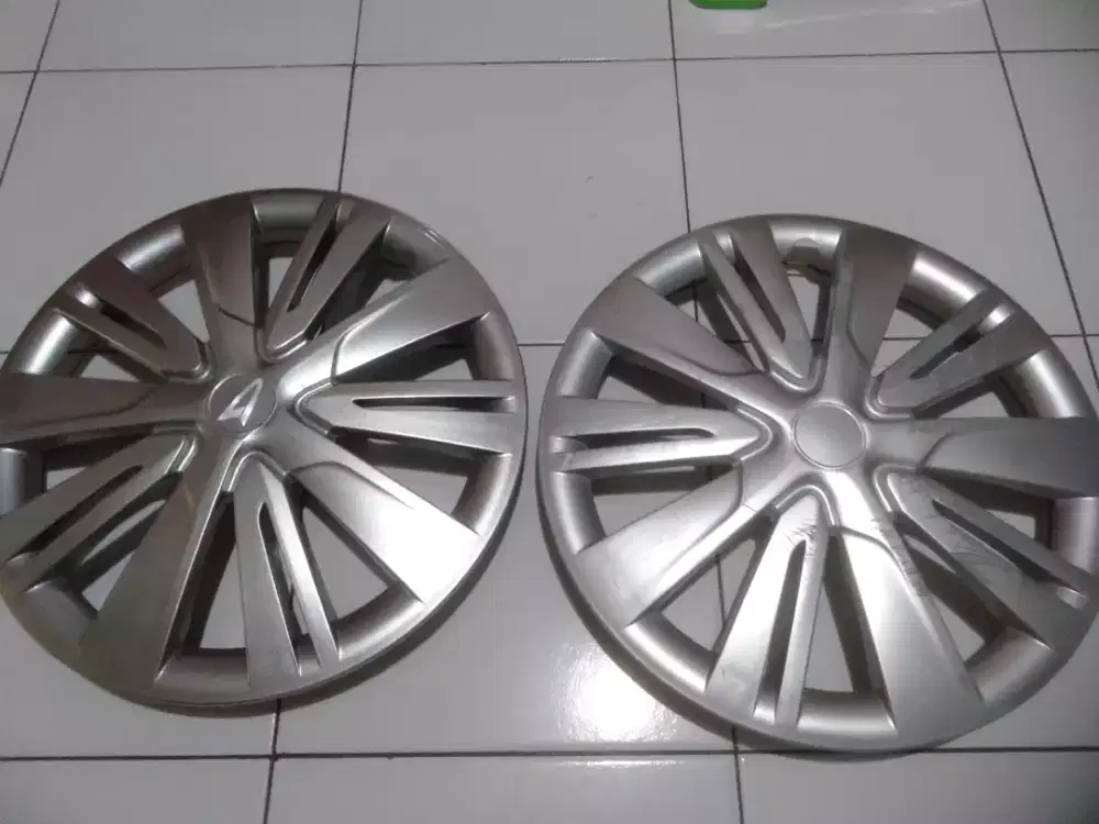 Dop pelek sigra original sigra