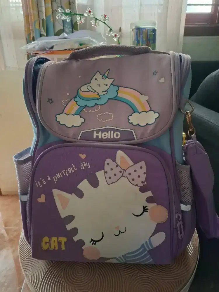 Tas Anak perempuan SD motif warna ungu masih OK
