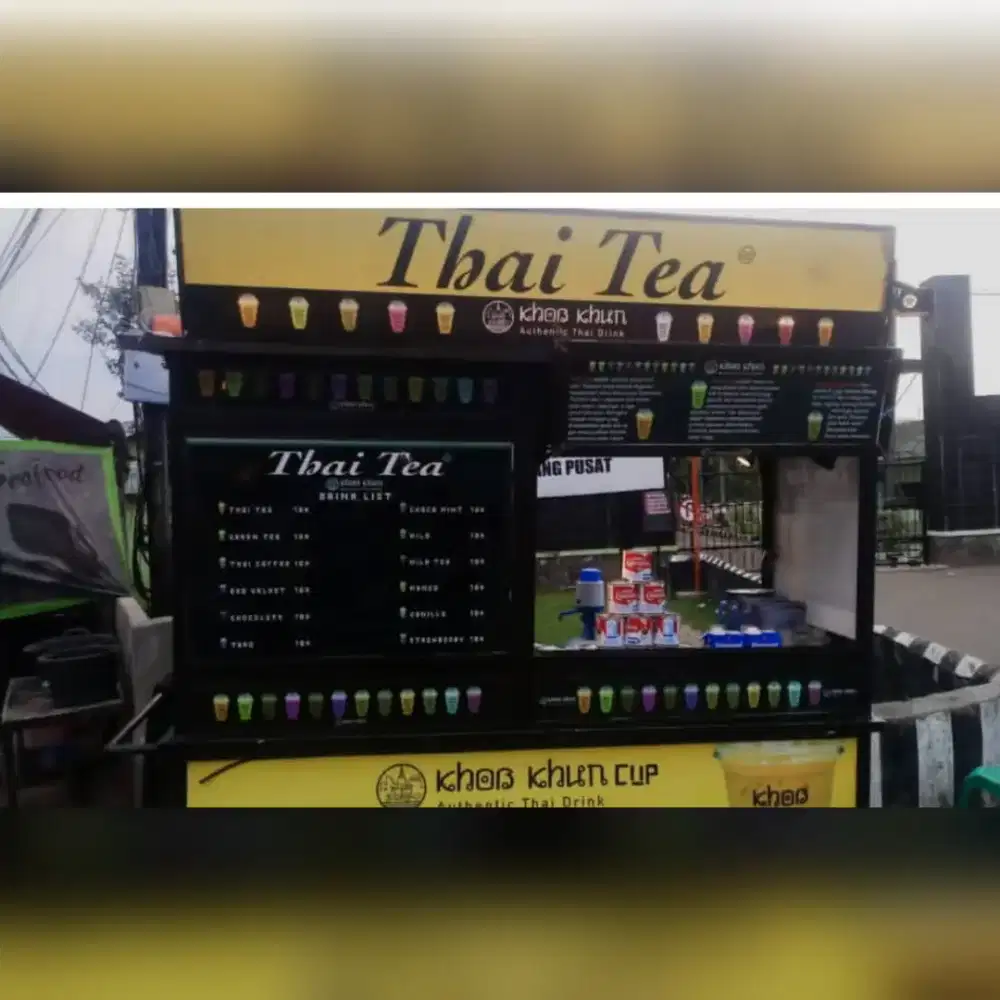 PENJAGA GEROBAK MINUMAN (THAI TEA)