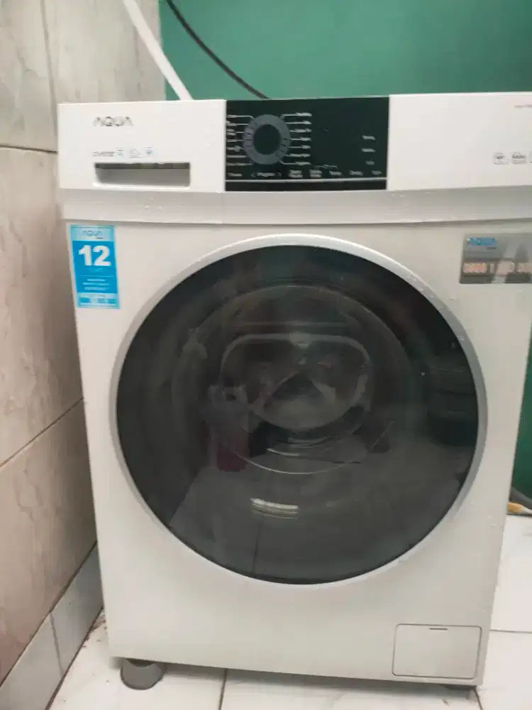 Mesin cuci aqua fron loading inverter