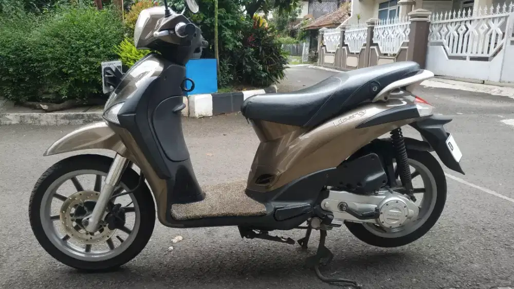 Piaggio Liberty bukan Vespa Yamaha Honda
