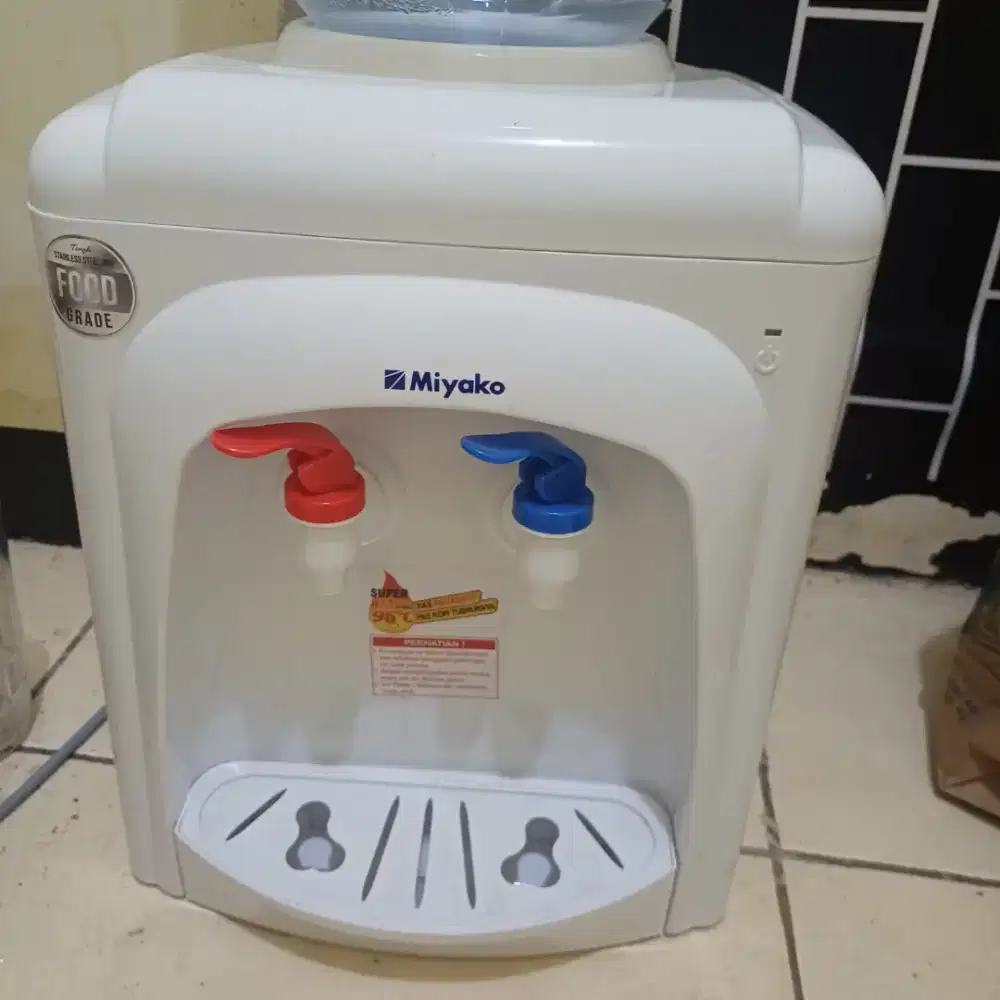 jual dispenser bekas harga 70