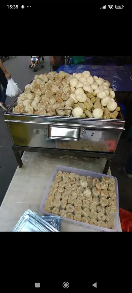 Penjaga stand dimsum