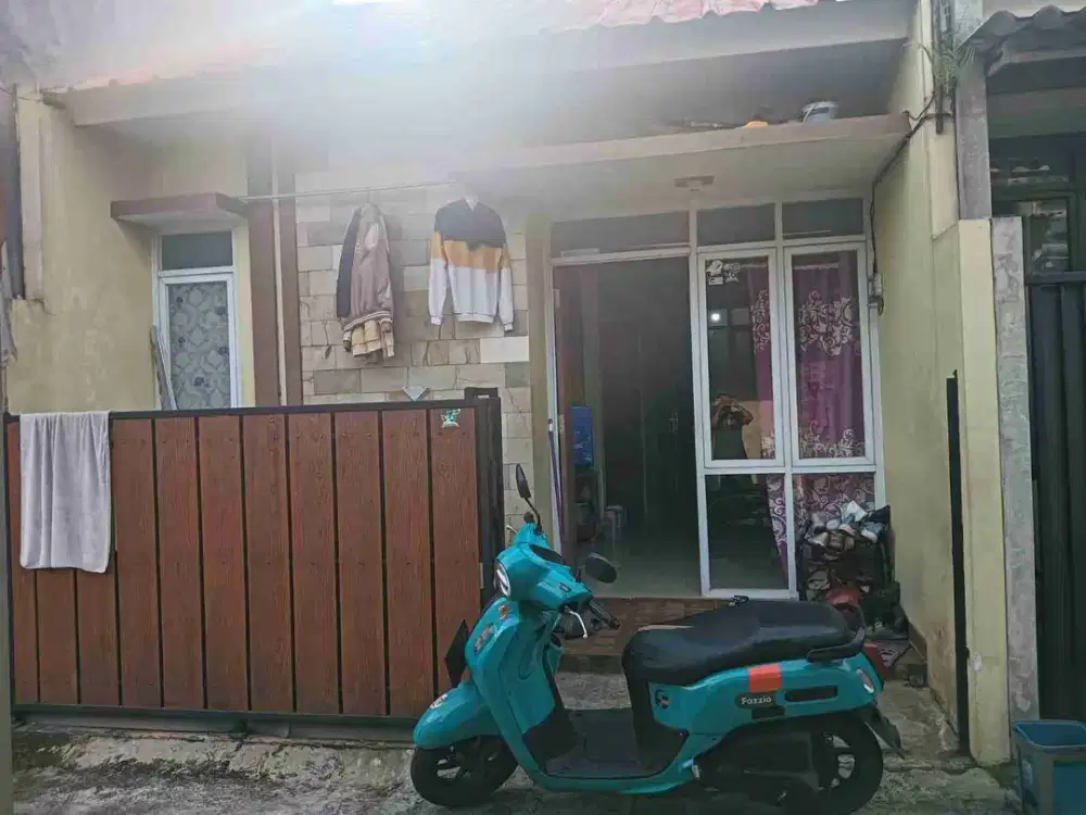 rumah minimalis di munjul Cipayung jkt timur dgn akses jalan masuk mbl