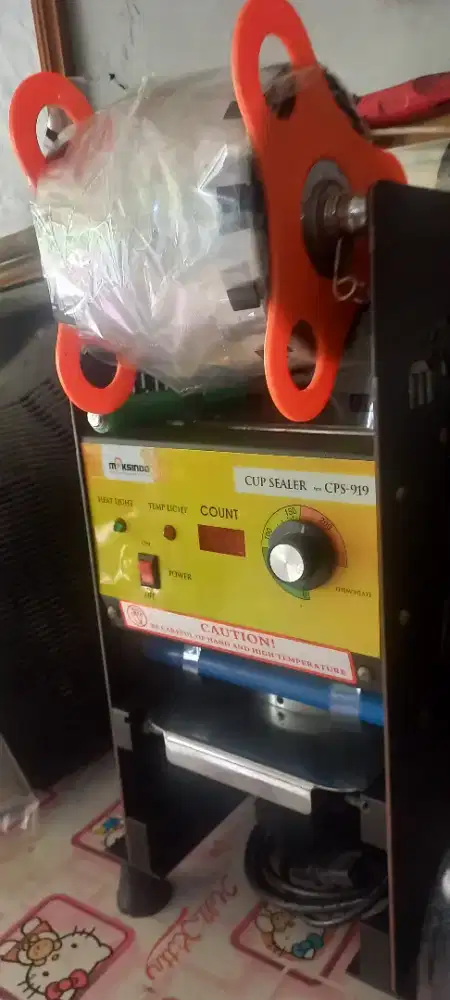 Cup sealer Maksindo