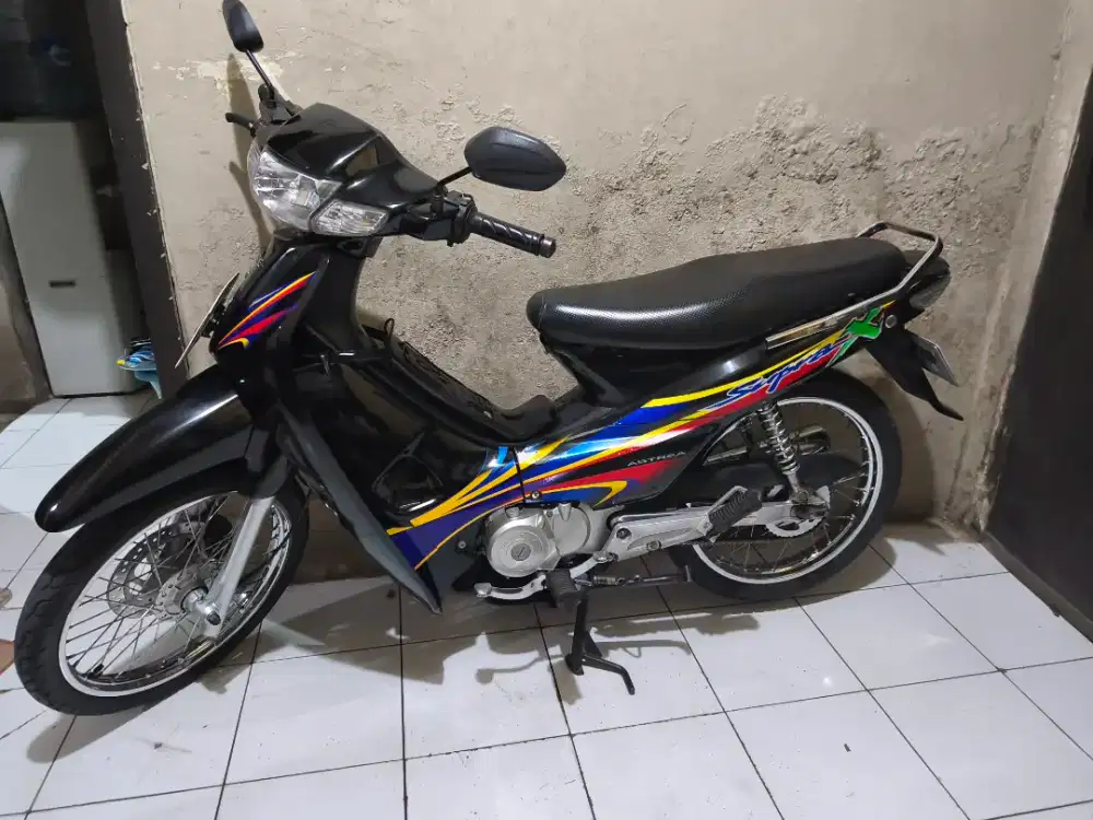 Supra x 100 lengkap isi