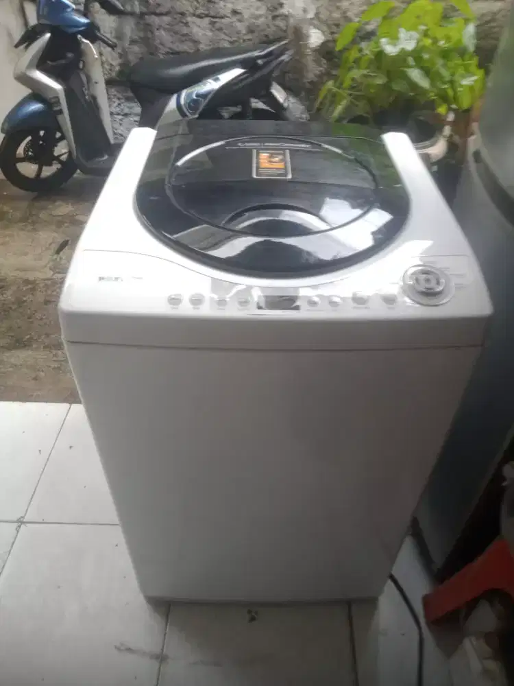 Mesin cuci top loding politron