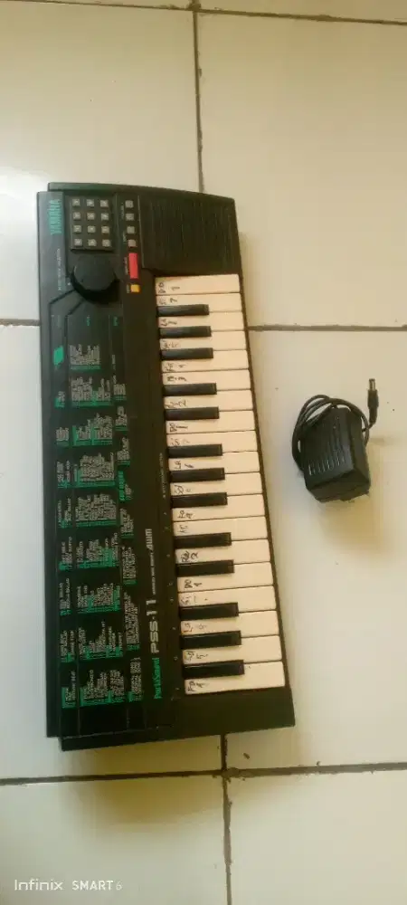 Piano anak Merk Yamaha pss-11