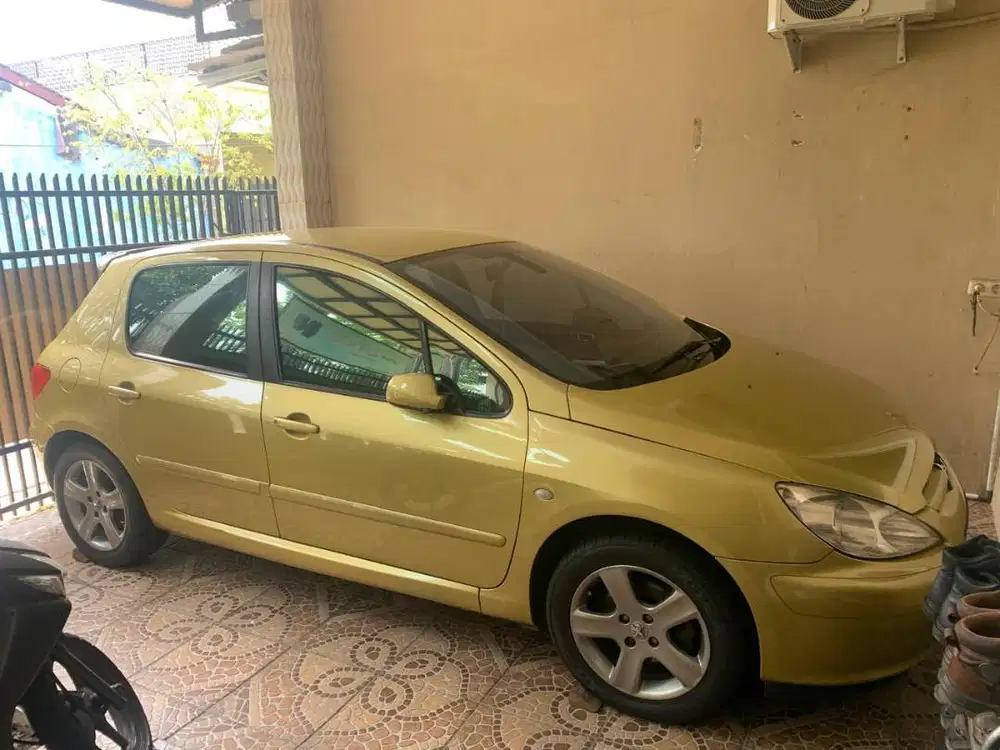 Peugeot 307 Sporty (2002) Kuning Metalik 1.600cc Manual Bensin