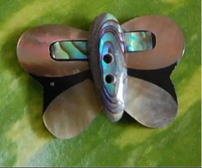 Kancing Baju dari Kulit Kerang