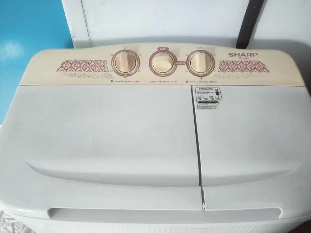 mesin cucu SHARP