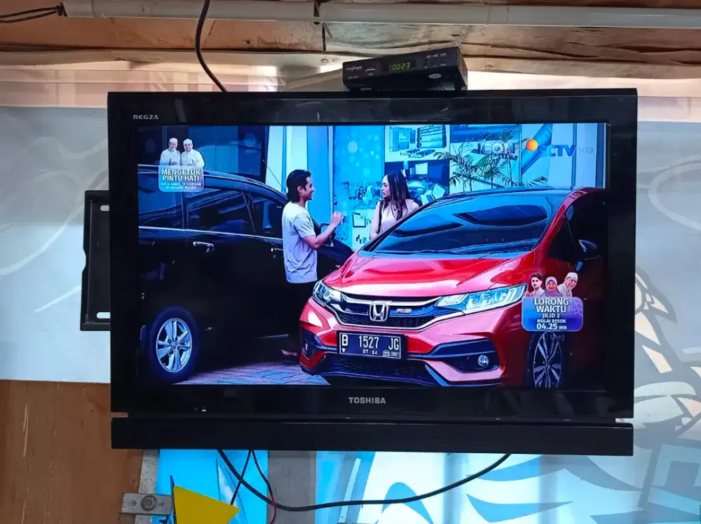1 set tv merk TOSHIBA dan stb