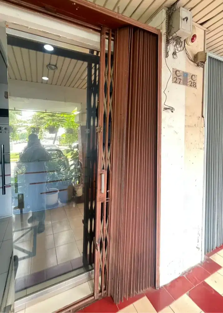 Tukang reparasi rolling door folding gate murah jakarta timur