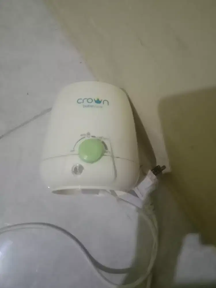 Crown penghangat susu normal