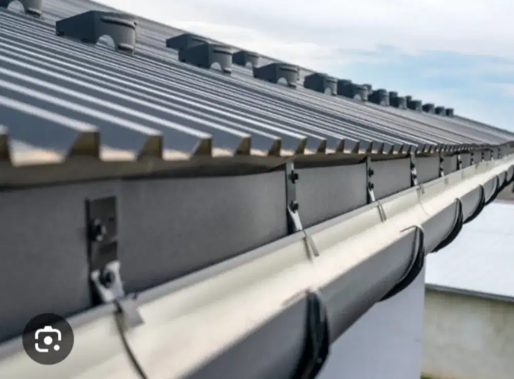 Tukang talang air. Bongkar pasang atap rumah