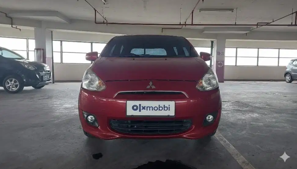 TERMURAH Mitsubishi Mirage 1.2 Exceed Bensin-AT Merah 2013