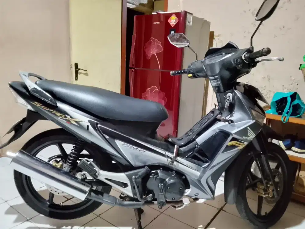 supra x 125 2010 injeksi double disk