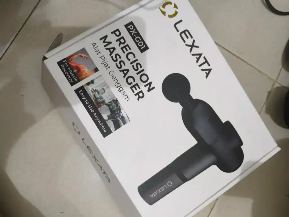 Lexata alat pijat genggam