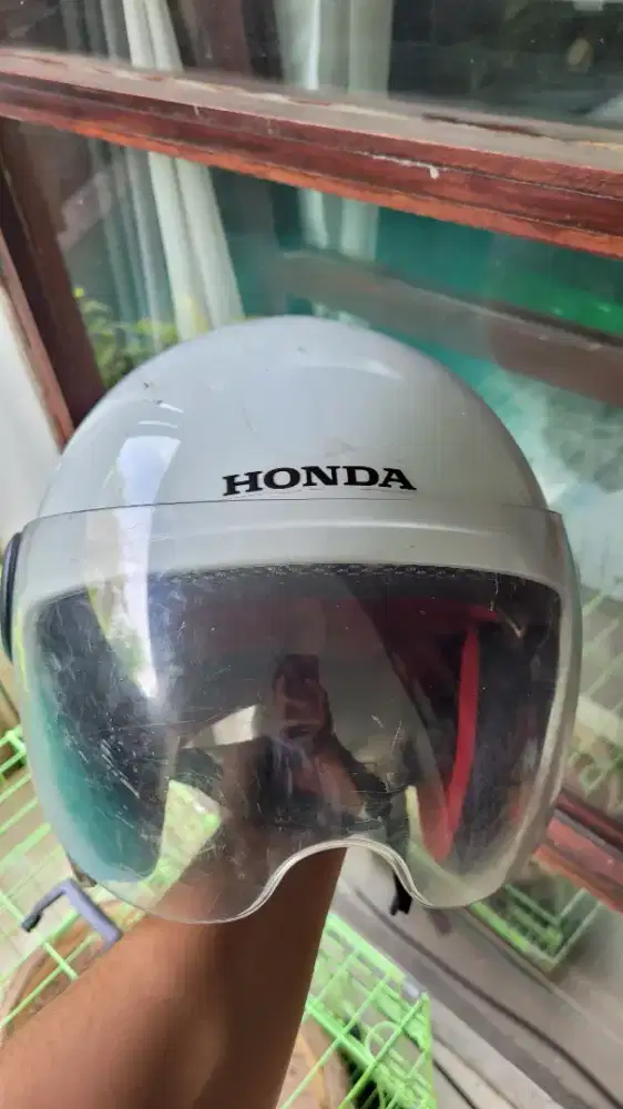 Helm ori honda.