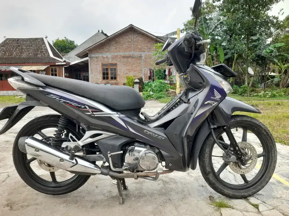 Supra X 125 helm-in plat cantik