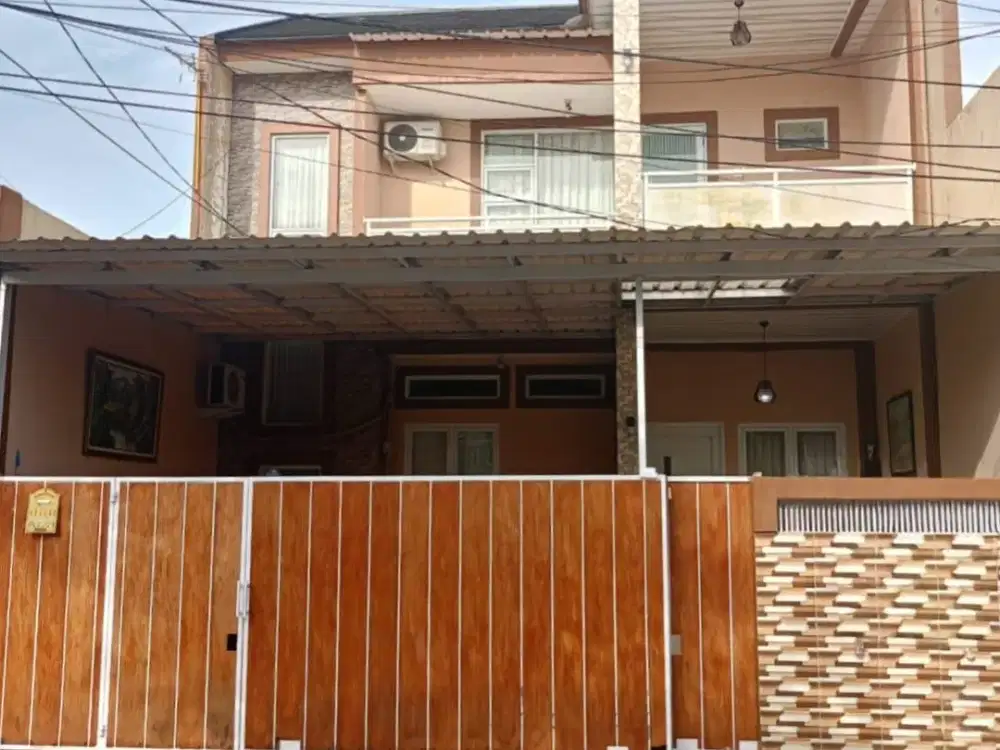 Rumah jalan utama 2 lantai di cluster Citra Raya Cikupa.