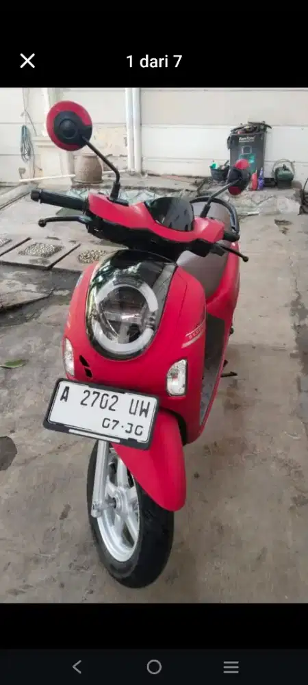 Scoopy Tangan pertama
