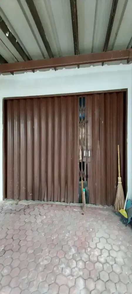 PINTU GARASI RUMAH