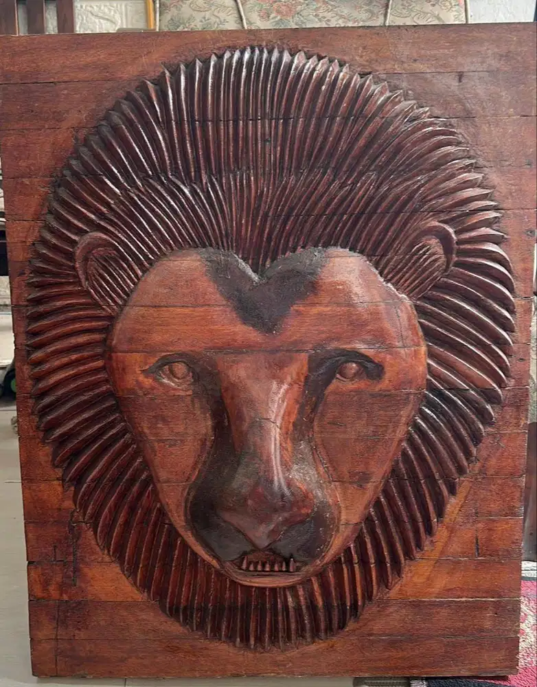 Ukiran kayu jati kepala singa