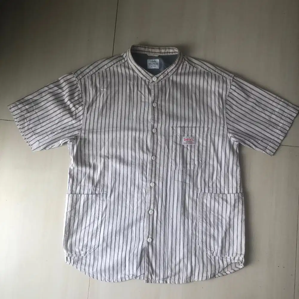 Kemeja salur lengan pendek