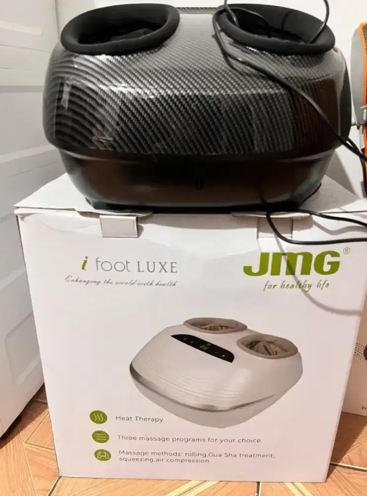 Mesin pijat refleksi kaki JMG