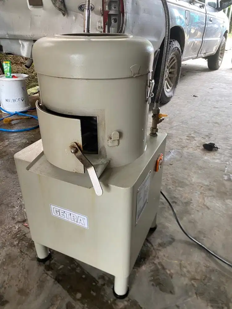 Mesin pengupas kentang dan ubi