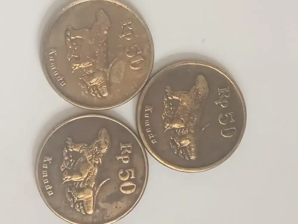 Dijual 3 uang koin Rp 50 komodo