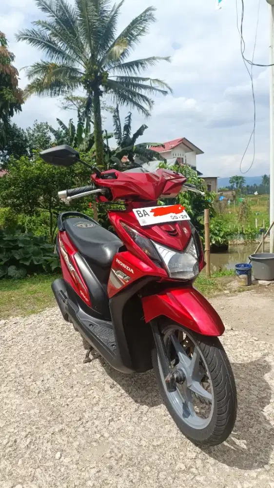 Beat tahun 2014 Merah merona