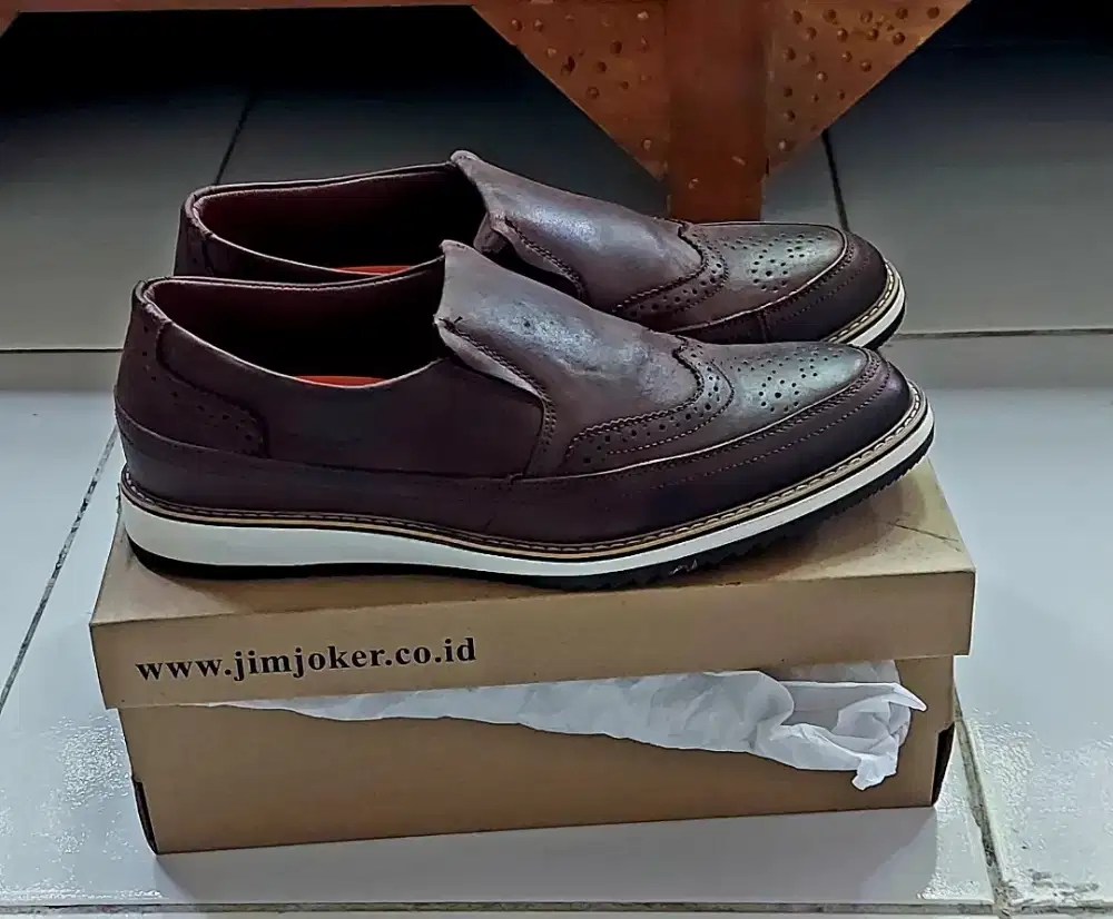Sepatu bekas ori (kulit)