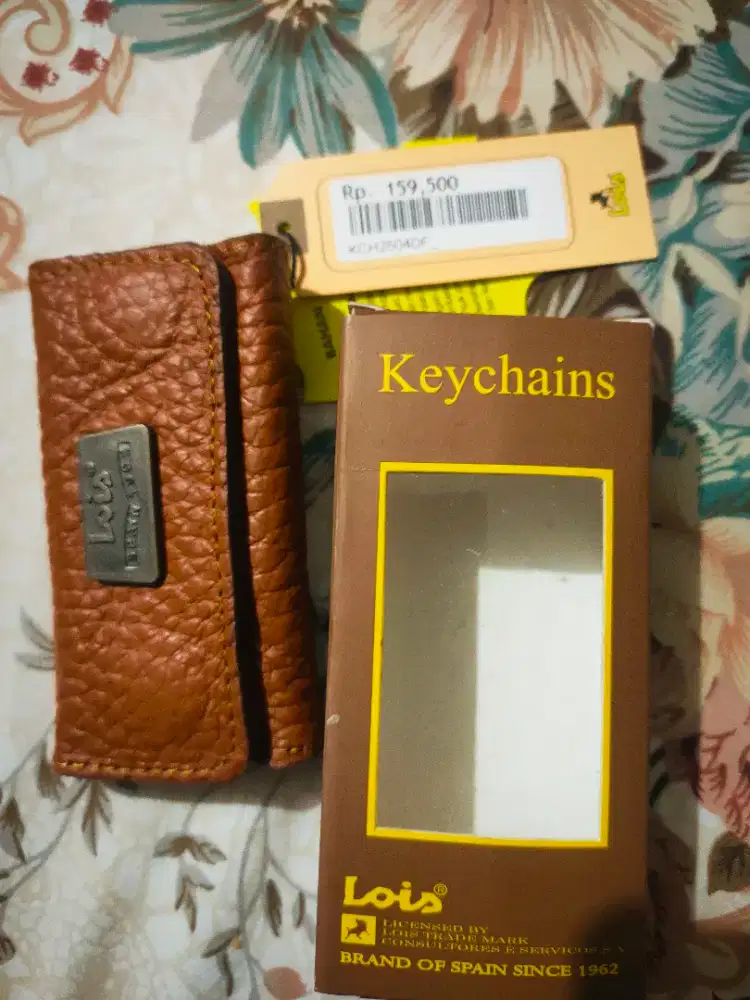 jual dompet untuk simpen STNK motor mobil merk LOIS