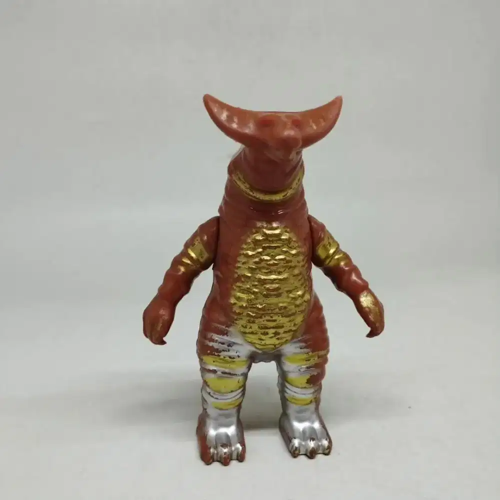 Mainan figure kaiju coklat