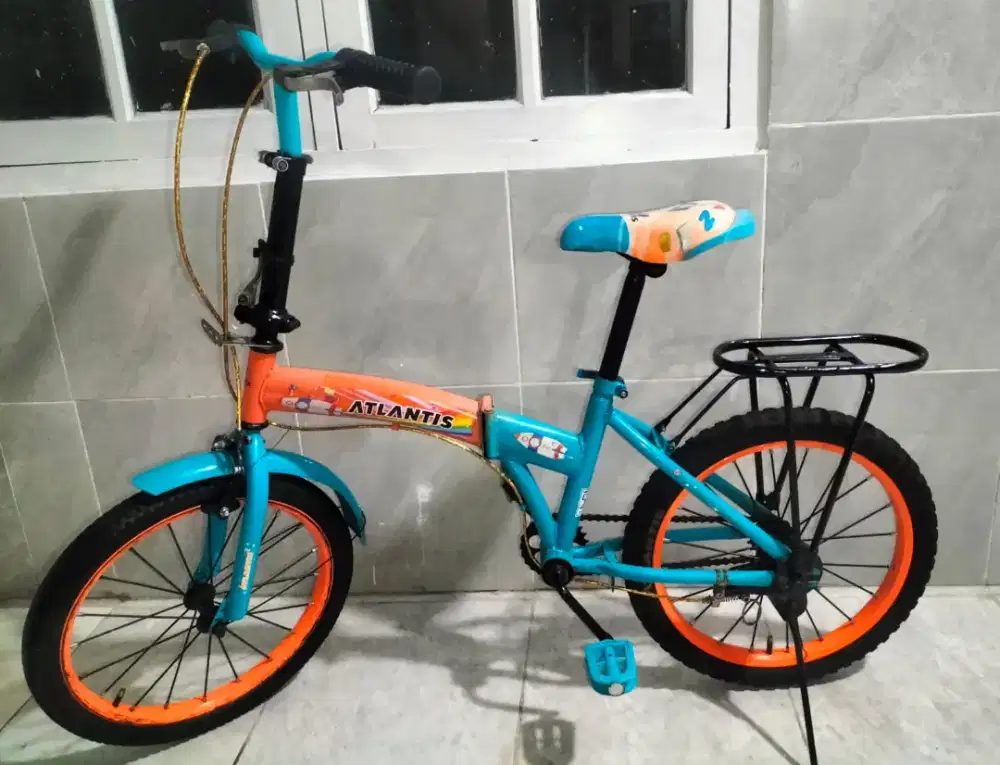 Sepeda lipat ukuran 18 untuk usia 6 7 8 9 tahun