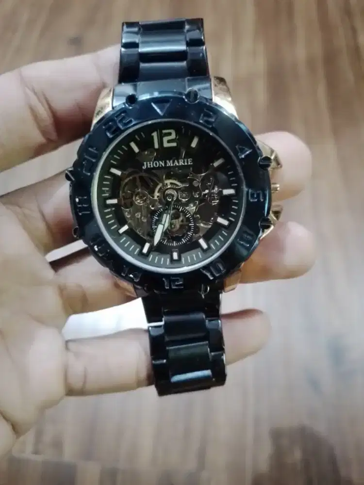 Jam otomatis jhon marie