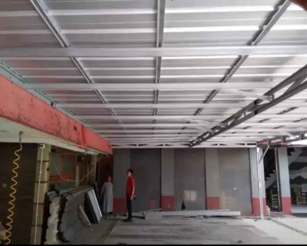 Pasang baja ringan atap spandek SNI