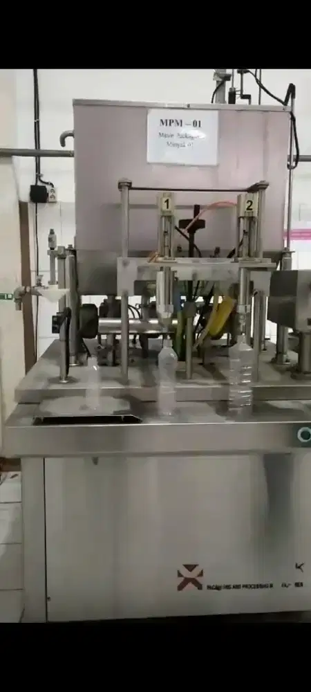 DIJUAL MESIN PENGISIAN MINYAK GORENG Kemasan BOTOL dan JEREGEN