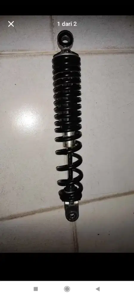 Shock belakang Lexi 125