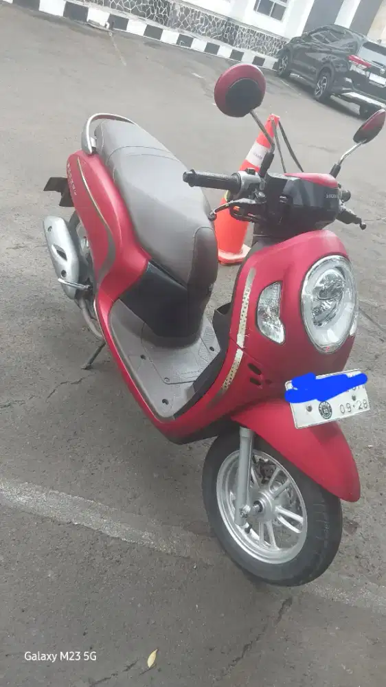 Honda Scoopy keyless.warna merah,kondisi mesin bagus,kelistrikan aman.