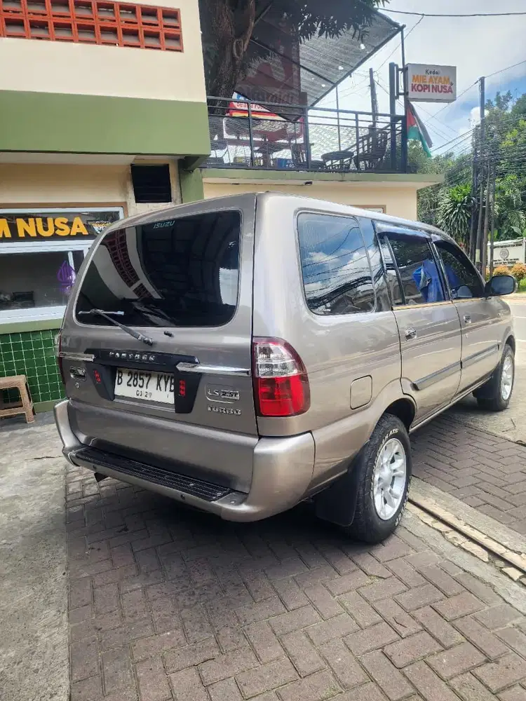 Izusu panther LS 2.5 Turbo manual th 2012 coklat metalik nopol Ganjil
