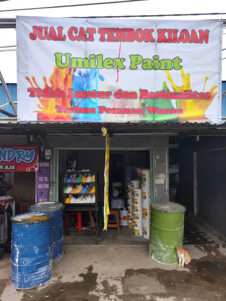 Cat tembok kiloan