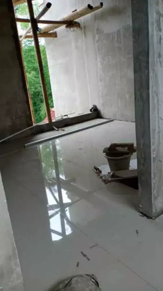 Tukang dan kenek bangunan