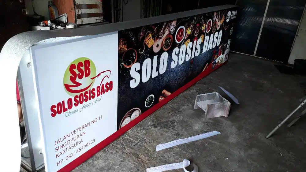 Pembuatan neon box service papan nama toko bongkar pasang reklame Solo