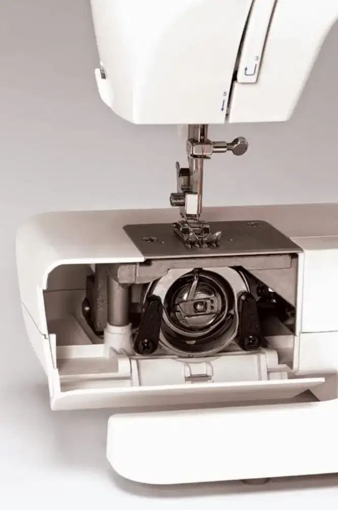 Service mesin jahit portable singer Messina