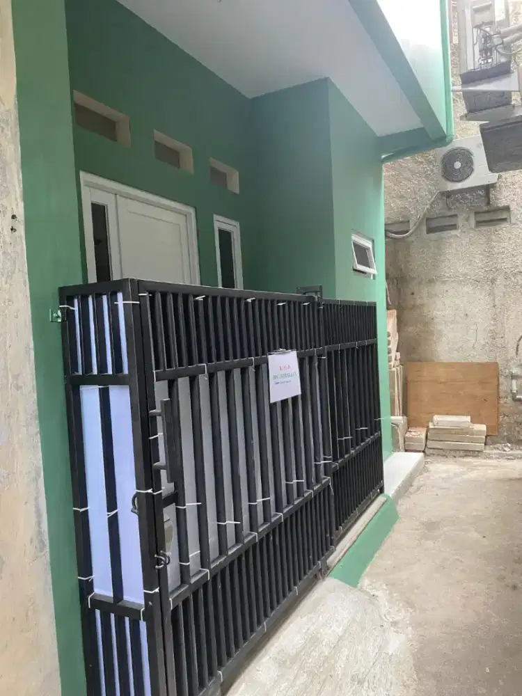 Kontrakan Pak Ustadz Aang